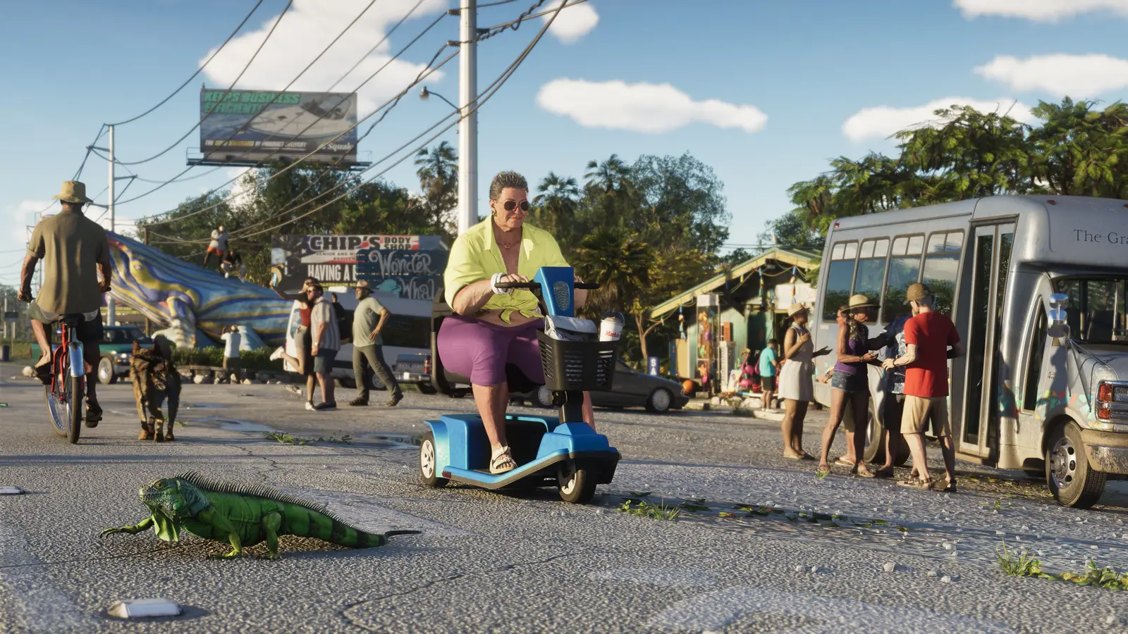 Un iguane traverse devant un scooter de mobilité dans une rue des Leonida Keys.