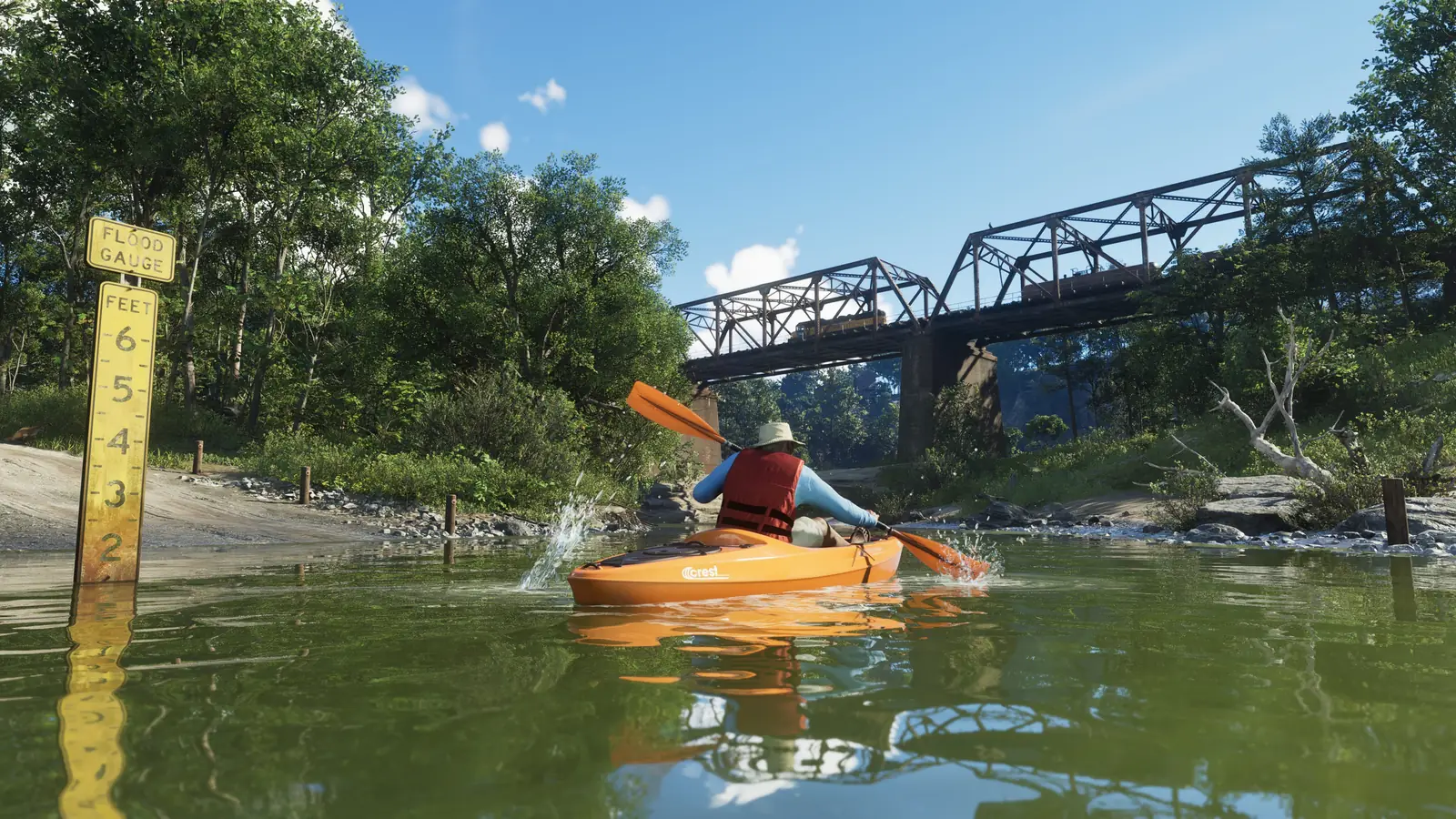Une personne en gilet de sauvetage pagaie en kayak vers un pont à Mount Kalaga.